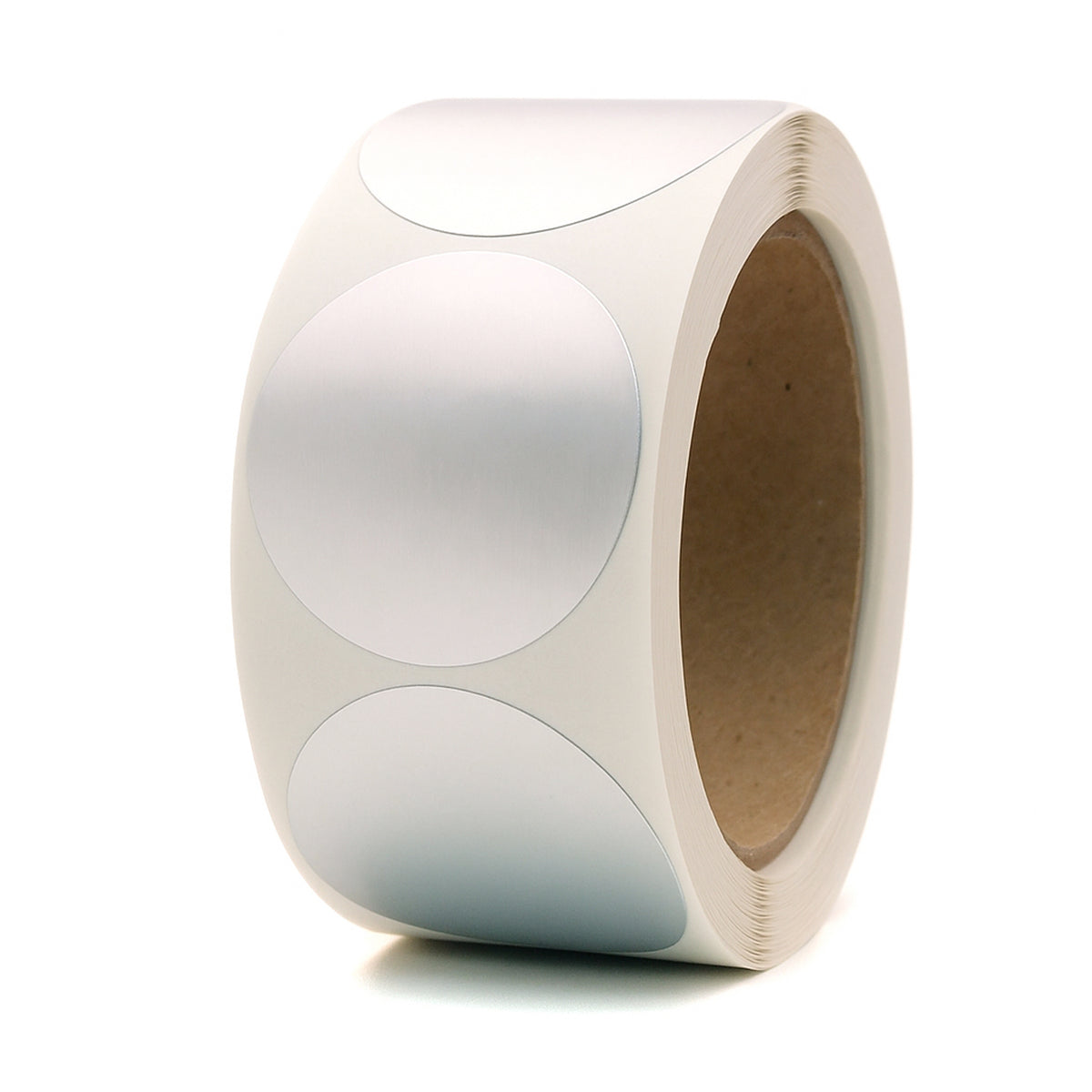 Roll of white round metallic embosser stickers on a white background